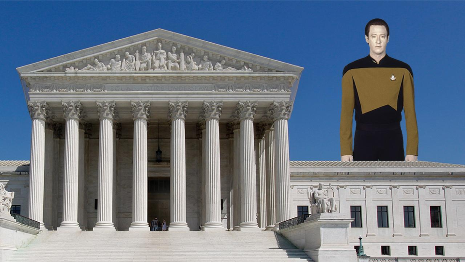 Image of the character Data as a giant standing next to the Supreme Court